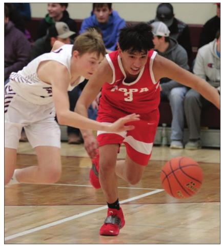 Timber Lake’s Kyler Bollinger (LEFT) and Tiospaye Topa’s AJ Begay race each other to the ball during their Region 8B tournament matchup last week. The Panthers defeated the Hawks to advance. Photo by Jon Flatland