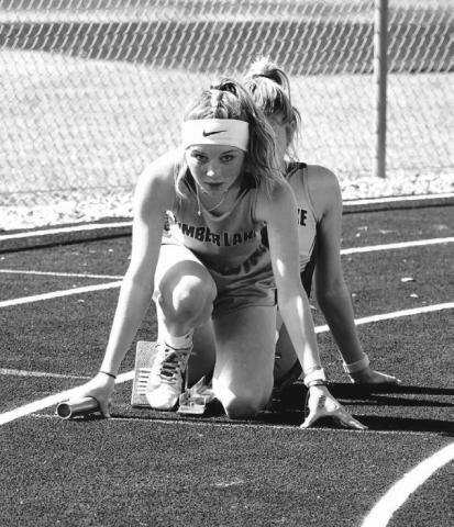 Timber Lake’s Kenlea Heck stays focused on the track ahead of her as she lines up for the start of the 800 meter relay during recent track meet action. Heck and teammates Arianna Bieber, Sara Keller and Kiya Mowrer won the LMC title in the event on Monday in Lemmon. Courtesy Photo