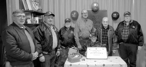 Herman Rosenau of Meadow, who turned 100 on February 13, was honored by the Post 120 American Legion and Auxiliary on February 7. The event was held at the UCC Church in Isabel. Pictured at right are Herman (seated) and American Legion members (l-r) Philip Schwalm, John Dean Boldt, Allen Johnson, Jeff Stradinger, Loris Lindskov, and Darrel Burke.