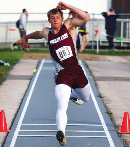Timber Lake junior Hank Kraft makes a triple jump during the state meet last week. Photo by Ryan Deal, Mitchell Daily Republic