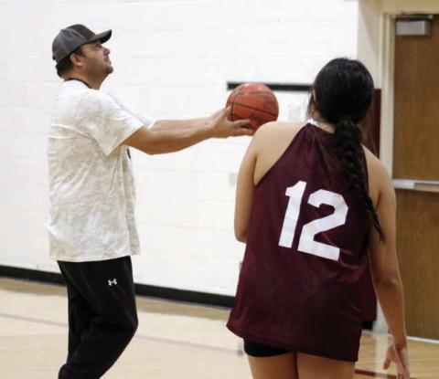 New Timber Lake girls basketball coach Tuffy Thompson works with senior Kessa Bigger under the basket during practice on Monday, Dec. 2. The Lady Panthers open their 2024-25 season on Friday with a road trip to Groton. They follow that with a trip to Wakpala on Tuesday, Dec. 10. Photo by Jon Flatland