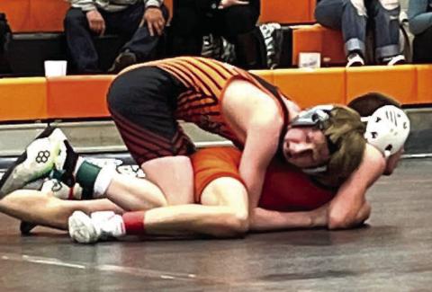 Taggen Paxton (top) works against an opponent during recent McLaughlin-Timber Lake wrestling action. Paxton won top honors at 100-103 pounds at the Ipswich-Bowdle JV Meet on Jan. 22. Photo by Denise Perryman