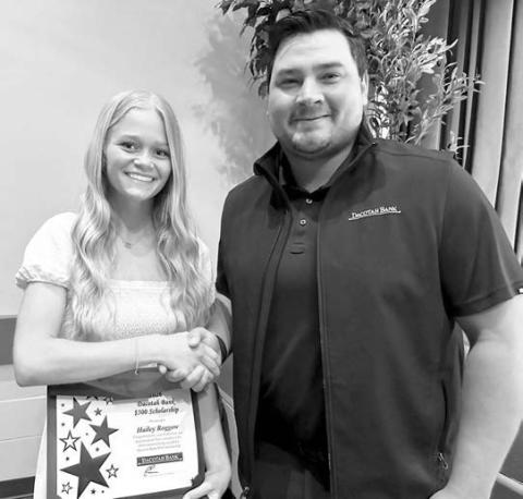 For over 30 years, Dacotah Bank has offered scholarships to high school seniors whose families are customers of Dacotah Bank and Dacotah Insurance. Over $70,000 in scholarships were awarded this year throughout South Dakota, North Dakota, and Minnesota. Timber Lake senior Hailey Roggow (left) was presented with a $2,000 scholarship by Senior Ag Banker Fred Vogel (right) from the Dacotah Bank in Mobridge.