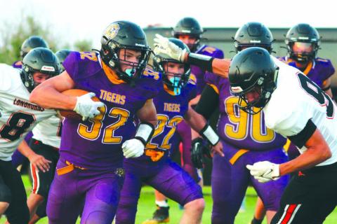 Dupree running back Brayden Terveen-Smith was a plow horse for the Tigers in their football season opener last Thursday, Aug. 17. The junior racked up 187 yards on 15 carries in Dupree’s 42-14 win over Faith. Photo by Patty Peacock