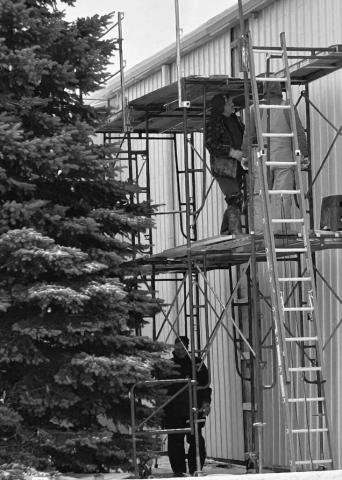Rusty Simon and his crew braved snow and cold temperatures last week to make repairs to the outer tin on a portion of the Isabel Community Center.