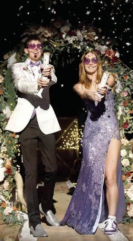 Jackson Bigger and Jaycie Lemburg fire confetti in the air during the Grand March at Timber Lake High School’s 2025 Prom on Saturday, April 26. Watch next week’s Topic for more TLHS Prom photos and look in this issue for photos from the Dupree High School Prom. Photo by Chuck Miner