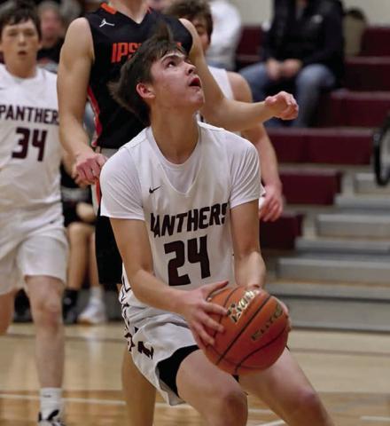 Sophomore Kanton Hunt eyes the hoop on his way to an easy basket off a steal during Timber Lake’s win over Ipswich on Saturday. Photo by Maria DuPreez