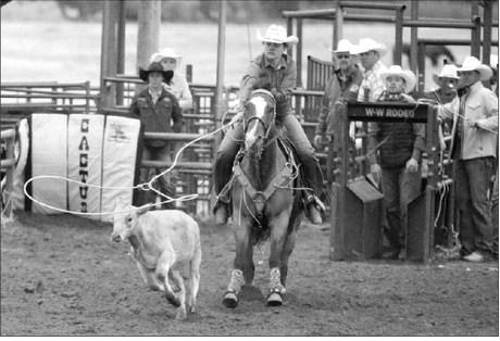 Bailey Donner makes a perfect throw during ladies breakaway roping at the Isabel Rodeo. The Morristown cowgirl finished in a tie for second place in the event with a 3.0 second run to collect a $992 check. Donner is currently fourth in the SDRA’s season ladies breakaway standings. Photo by Jon Flatland