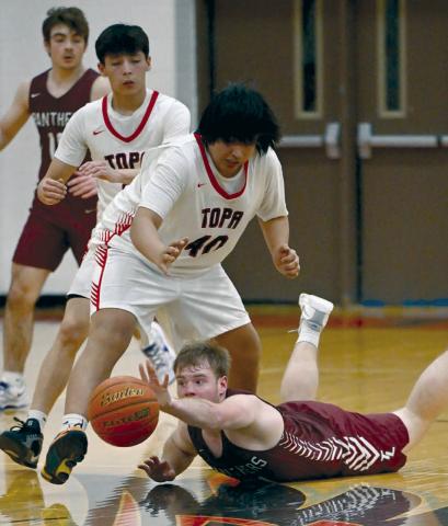 Timber Lake Panther senior Treyton DuPreez dives for a loose ball in front of Tiospaye Topa’s Steven Garnette during boys hoops action on Saturday. The Panthers are 6-2 and riding a five-game win streak into meetings with Herreid-Selby on Thursday, Jan. 16, and winless Aberdeen Christian in Redfield on Saturday, Jan. 18. Find more sports on Pages 8-10 and 12. Photos by Marie DuPreez