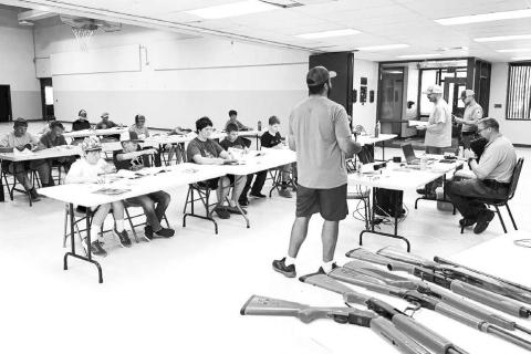 Eighteen students age 11 and older took the HuntSafe class offered by the South Dakota Department of Game, Fish and Parks at Timber Lake on July 10. Completion of the course made them eligible for a youth hunting license at age 12. Above, Jakways Mendoza, a Timber Lake teacher, was one of the instructors, along with Kyle Nilson of Timber Lake and GF&amp;P personnel. Photo by Kathy Nelson