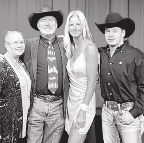 Michelle Alley and her brother, J.J. Alley (RIGHT) with Paul and Traci Brown (AT LEFT) when Michelle was inducted into the Hill College Athletic Hall of Fame. Michelle and J.J, are children of Robert Alley of Isabel. Paul Brown was her rodeo coach at Hill College.