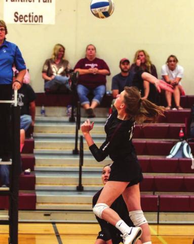 Molly Kraft rises to spike the ball during the Panthers’ game versus Bison last week in Timber Lake. Photo by Jon Flatland