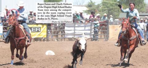 Roper Eaton and Charly Etzkorn of the Dupree High School Rodeo Team were among the competitors in the team roping event at the state High School Finals Rodeo in Ft. Pierre. Photo by Jon Flatland