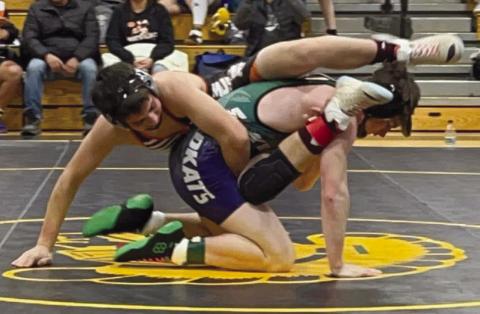 McLaughlin/Timber Lake’s Levi Berndt (top) tries to apply a leg scissor to an opponent at the Faulkton Wrestling Invitational on Saturday, Dec. 9. Photo courtesy of Denise Perryman