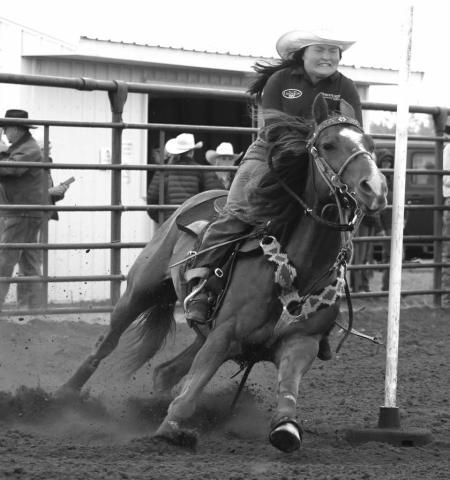 Brelan Maher of Isabel closed her eyes and hung on as she guided her horse around a pole during the Dewey County 4-H Rodeo held in Timber Lake on Sunday, May 26. 4-H members from across the region competed in the annual event. Photo by Jon Flatland Check out the Topic Facebook page for many more photos from the Dewey Co. 4-H and Timber Lake HS rodeos and the OK Livestock Steer Wrestling Shootout!