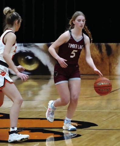 Senior guard Averie Marshall (5) brings the ball into the front-court for the Timber Lake Lady Panthers during recent girls basketball action. The Lady Panthers will play in the Little Moreaeu Conference Tournament this week. The tournament bracket had not been released by the time this issue of the Topic went to press. Photo by Marie DuPreez
