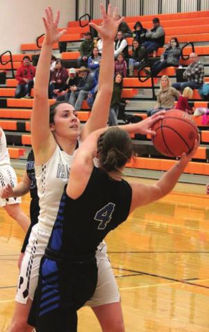 Timber Lake senior Maci Maher’s defense has a South Border player all locked up during their game at the Mobridge Rotary Classic. Photo by Jon Flatland