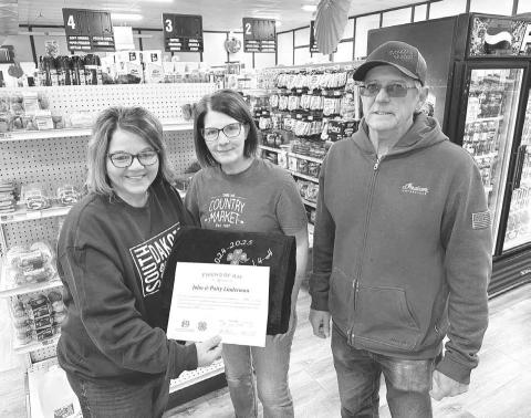 John and Patty Linderman of Country Market received the Outstanding Friend of 4-H Award, presented by Dewey County 4-H Advisor Rita Long (left) in recognition of their contributions to the 4-H program.