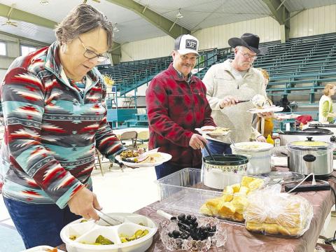 The Isabel Community Center was filled with the smell of great food and the sound of great fellowship on Sunday, Nov. 3, during the Prairie Parsish Churches annual Fall Festival. Among those enjoying turkey, ham and more were (l-r) Laurie and Bill Bickel and Jeff Stradinger. Silent and live auctions were held following the meal. Photo by Kathy Nelson