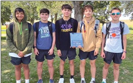 The Dupree boys cross country team won the boys varsity title at the Redfield Pheasant XC Invitational last Thursday, Aug. 31, by placing three runners in the top 10. Team members are, l-r, Jeremiah Tiger, JW Pederson, TayShaun Cudmore, Jayden Marshall and Spencer Olsen. Pederson, Cudmore and Olsen all finished in the top 10.