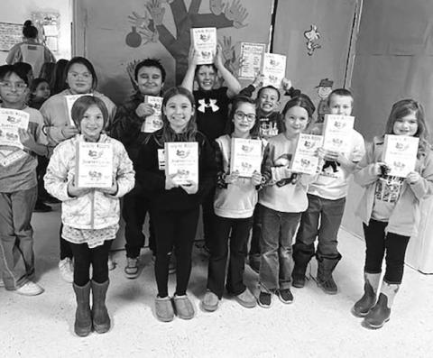 Third graders across the state, including these from Timber Lake Elementary School, received a free book from the S.D. Humanities Council and a group of sponsors. Photo courtesy of Carrie Beer