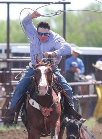 Brady Maher chases down a calf while roping in the Dewey County 4-H rodeo Sunday. Photo by Jon Flatland