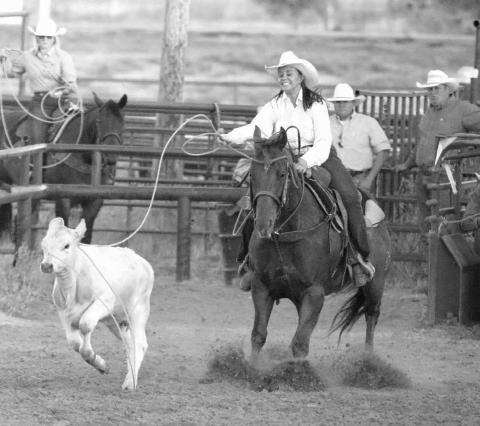 Kashlin Bettelyoun of Eagle Butte grimaces as she watches her rope slip off the head of a calf during ladies breakaway roping action at the Faith Stock Show and Rodeo last weekend. Photo by Jon Flatland