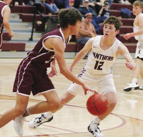 Panther sophomore Cole Ducheneaux (12) plays defense against McIntosh earlier this season. Photo by Jon Flatland