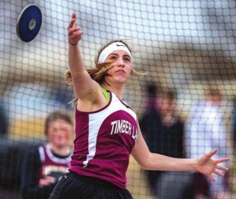 Mckenzi Vomacka launches a discus in junior high track meet action. The TL JH girls won the conference meet. Photos by Robert Slocum