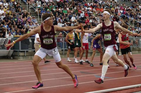 Holden Gill(right) passes the baton to Broc Bauer during the boys 1600 meter relay at the South Dakota State Track &amp; Field Meet last weekend. Gill and Bauer along with Landen Bieber and Jackson Bigger finished third overall. Check out the Topic Facebook page for more photos from the state finals. Photo by Marie DuPreez