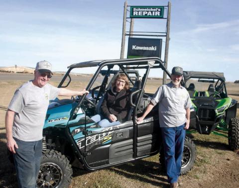 Schmeichel’s Repair in McLaughlin is marking its 50th anniversary as a Kawasaki dealer. Pictured are (l-r) Dan Schmeichel, Pattie Schmeichel and Harvey Schmeichel. Founder Lester Schmeichel became a Kawasaki dealer in 1972 and the dealership remains a mainstay in the region today. Photo by Jon Flatland