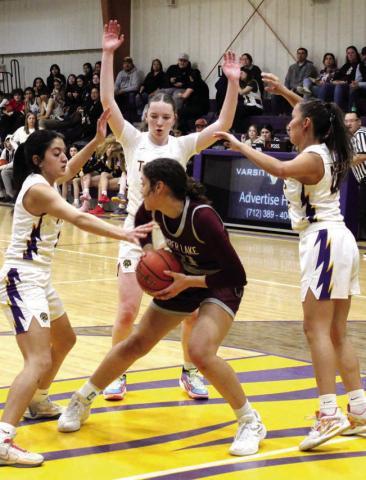 Timber Lake’s Jasmine Nash found herself surrounded by Dupree Tiger defenders after pulling down a rebound during action last Tuesday in Dupree. Nash notched a double-double with 14 points and 10 rebounds but Dupree collected a 56-52 win. Photo by Patty Peacock