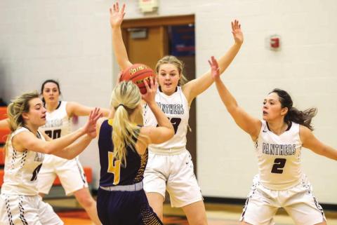 Panther players (L-R) Shay Kraft, Maci Maher, Stormi Hulm and Tia LeBeau play defense.