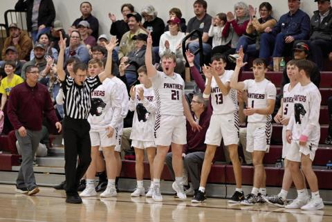 The Timber Lake Panther bench and fans celebrate a long 3-pointer by Treydon Beer late in Timber Lake’s matchup with Kadoka Area last Tuesday, Jan. 28. Every basket counted as the Panthers battled the Kougars into overtime before pulling out a 61-60 victory for their 10th win of the season. Timber Lake hosted Dupree on Tuesday, Feb. 4, and will welcome Harding County on Thursday, Feb. 6. Photo by Marie DuPreez