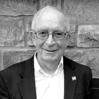 Robert “Bob” McGuire