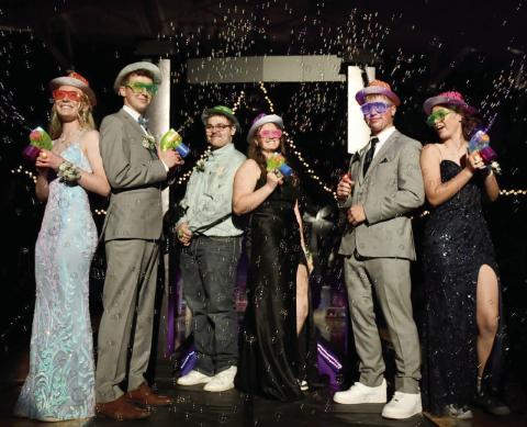 Having some “Miami Nights” fun with bubble guns at the Timber Lake High School Prom on April 25 are (l-r) Brynn Odenbach, Hudson Gill, Cooper Goldade, Mya Bauer, Devon Keller, and Ayla Bauer. Photo by Charles Miner