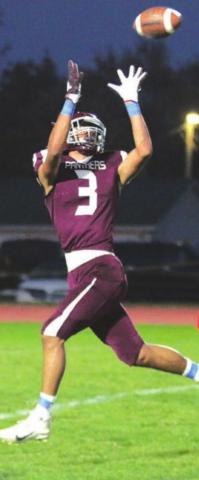 Chazz Gabe hauls in a pass in the Panthers’ win over Harding County. Photos by Jon Flatland