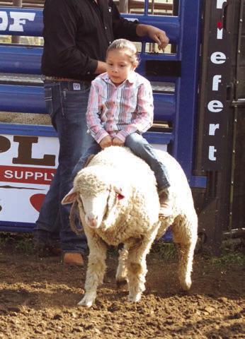 Ona Garreaux of Eagle Butte shows the form that won her first place in the Mutton Bustin’ competition at the 3 Rivers Ranch Rodeo held in Timber Lake on Saturday, Sept. 30.