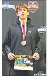 Mason Schrempp, a sophomore at Aberdeen High School, was named a 10th Grade All-American at the Adidas Wrestling Nationals held April 6-8 in Indpendence, MO. Schrempp placed third in the 145 pound division at the South Dakota State High School Tournament this season. An all-conference and all-state selection, he also earned his 100th career win. An enrolled member of the Cheyenne River Sioux Tribe, he is the son of Roy Veit and Ricki (Schrempp) Link and the grandson of Joe and Tammy Schrempp.