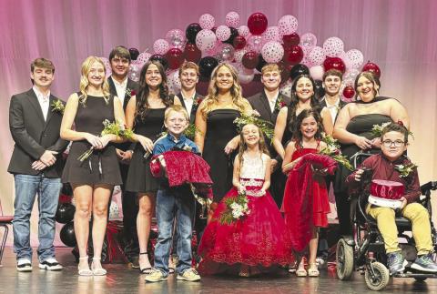 Pictured before the crowning of the TLHS Homecoming king and queen are the candidates and attendants. Front (l-r): Robe bearer Trevor Aberle, crown bearer Elliott Schweitzer, robe bearer Blake Booth, and crown bearer Ryker Bridges; Back: King and queen candidates Treyden Beer, Paislee Keller, Kanton Hunt, Jaylee Schoelerman, Hudson Gill, Katelyn Biegler, Kolby Holzer, Ruby Maher, Braden Lawrence, and Anna Kraft. Photo by Julie Marshall