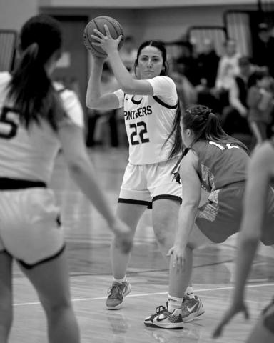 Kanton Hunt (left) lays up a shot during the Panther boys meeting with Tiospaye Topa last Saturday, Jan. 11. Hunt finished the contest leading all scorers with 25 points in the Panther victory. Above, guard Ruby Maher (22) looks for a teammate to pass to while running the Timber Lake offense against Potter County. The Lady Panthers take a three-game win streak into a matchup with visiting McLaughlin on Friday, Jan. 17. Photos by Marie DuPreez