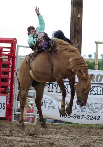 Taylon Carmody of Mobridge shows off the form that won him the bareback bronc riding title at three different rodeos over the weekend. Carmody leaves this week for Texas, where he will rodeo for Tarleton State University. Photo by Jon Flatland