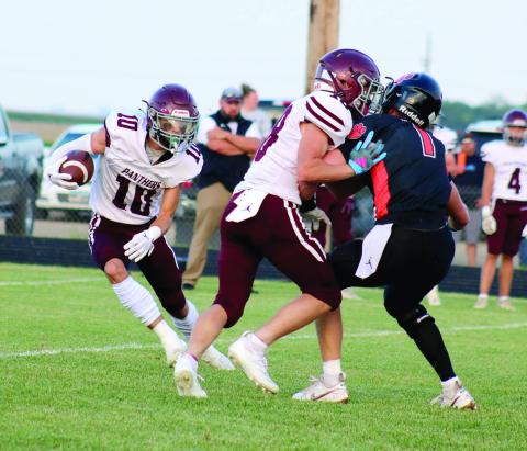 Timber Lake’s Gavin Farlee (10) follows the block of teammate Brody Ellison on a kickoff return last Friday night, Aug. 23, when the Panthers traveled to Ipswich to take on the Tigers in the South Dakota Class 9A football season opener for both clubs. Ipswich won the contest 42-0. Timber Lake hosts Philip at Doug Kraft Field this Thursday, Aug. 29, with kickoff slated for 6 p.m. Photo by Jon Flatland