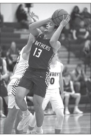 Panther forward Aidan Rough Surface puts up a running jumper during second round action of the LMC Tournament against Lemmon last Friday, Feb. 2. Rough Surface finished the game with a season-high 20 points. Photo by Marie DuPreez