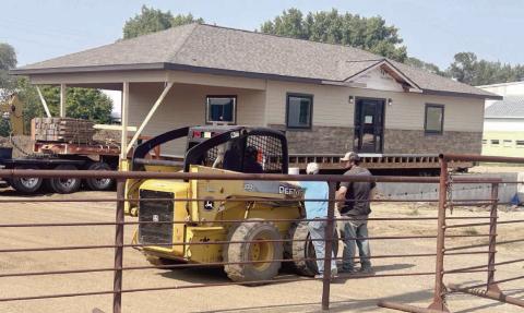 A new building for Western Dakota Bank’s Isabel branch rolled into town last week and was placed on its foundation. Built by Custom Touch Homes in Madison, the building is located on Highway 20 just south of the Isabel Community Center and includes a drive-through window. Western Dakota Bank is shooting for a November opening date in the new location. Photo by Jon Flatland
