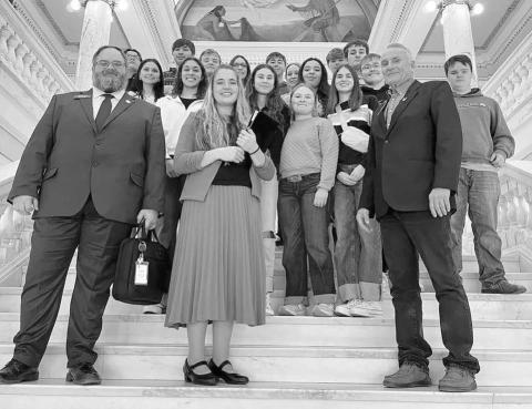 The Timber Lake High School senior class took part in Senior Day at the State Capitol in Pierre last week, touring the grounds and visiting several offices. The class is pictured with District 28 legislators (l-r) Rep. Travis Ismay, Rep. Jana Hunt, and Sen. Sam Marty. Chaperoning the students were Mr. Leuning and Mrs. Lemburg.