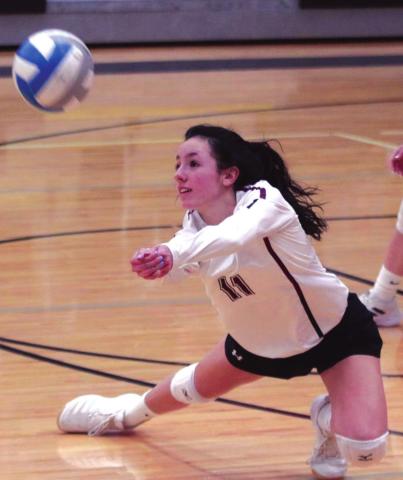 LEFT: Timber Lake senior Rachel Toviah lunges to make a play on a serve from Faulkton Area during their SoDak 16 round game.