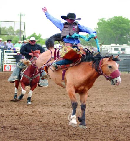 Rope Roghair of Isabel strung together three qualifying rides to capture fifth place honors in saddle bronc riding at the South Dakota High School Finals Rodeo in Ft. Pierre last weekend, June 15-18. Roghair also placed 18th in tie-down roping and 13th in team roping with teammate Rylee Price of Faith. Photo by Jon Flatland
