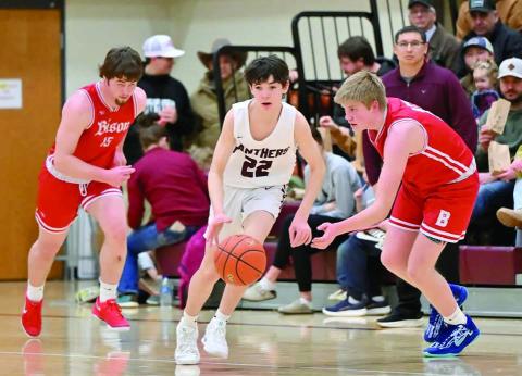 Pistol Pete ... Timber Lake freshman guard Pete Maher (22) heads upcourt after stealing the ball from a Bison player during the Panthers’ 55-51 win over the Cardinals last week. Maher came off the bench to score 15 points in the matchup. Timber Lake, 12-6 overall, travel to Eagle Butte Thursday, Feb. 20, to take on the 13-4 Braves in a clash between Dewey County teams. The Panthers will wrap up their regular season schedule on Feb. 28 by hosting Potter County. Photo by Marie DuPreez