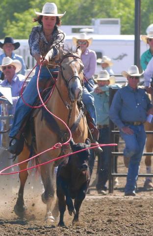 Acacia Anderberg of Mobridge, a member of the Timber Lake High School Rodeo Club, makes a perfect throw during the breakaway roping competition at the South Dakota High School Finals Rodeo in Ft. Pierre. Anderberg clocked a 4.440 second run during the second round of action on Friday, June 17. Photo by Jon Flatland